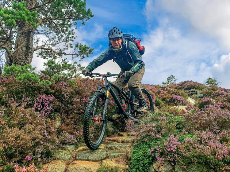 Photo of a cyclist on a rural path 